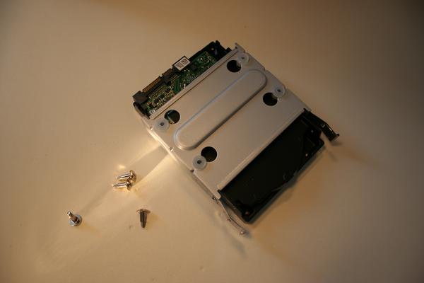 Attaching the hard drive to the mounting plate